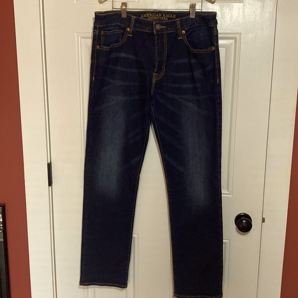 American eagle 34 waist 32 length dark blue with slight fading